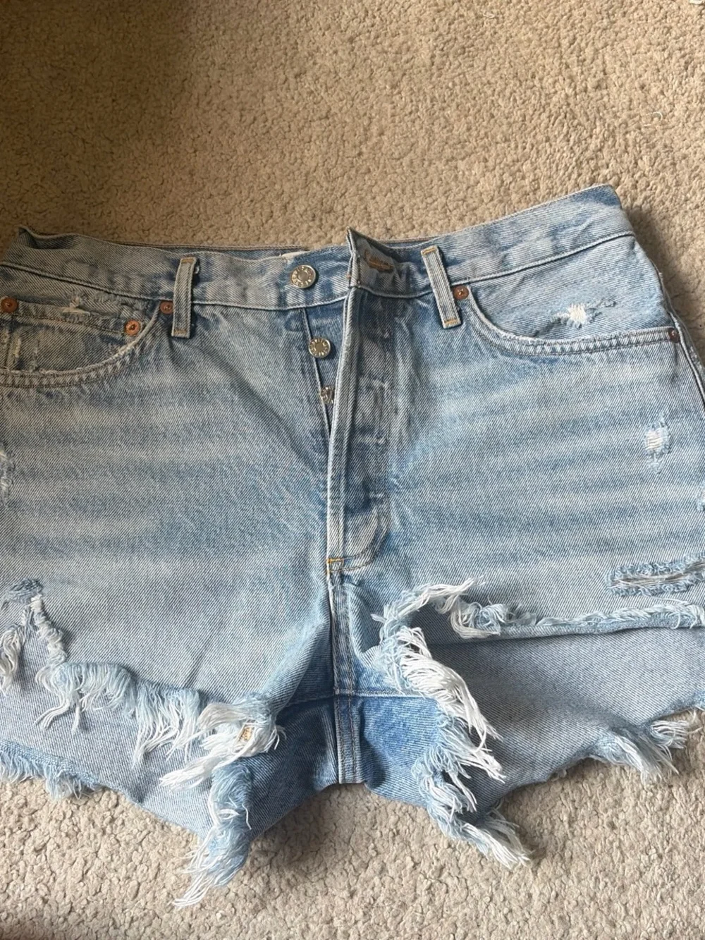 Agolde Light Wash Distressed Denim Cutoff Shorts